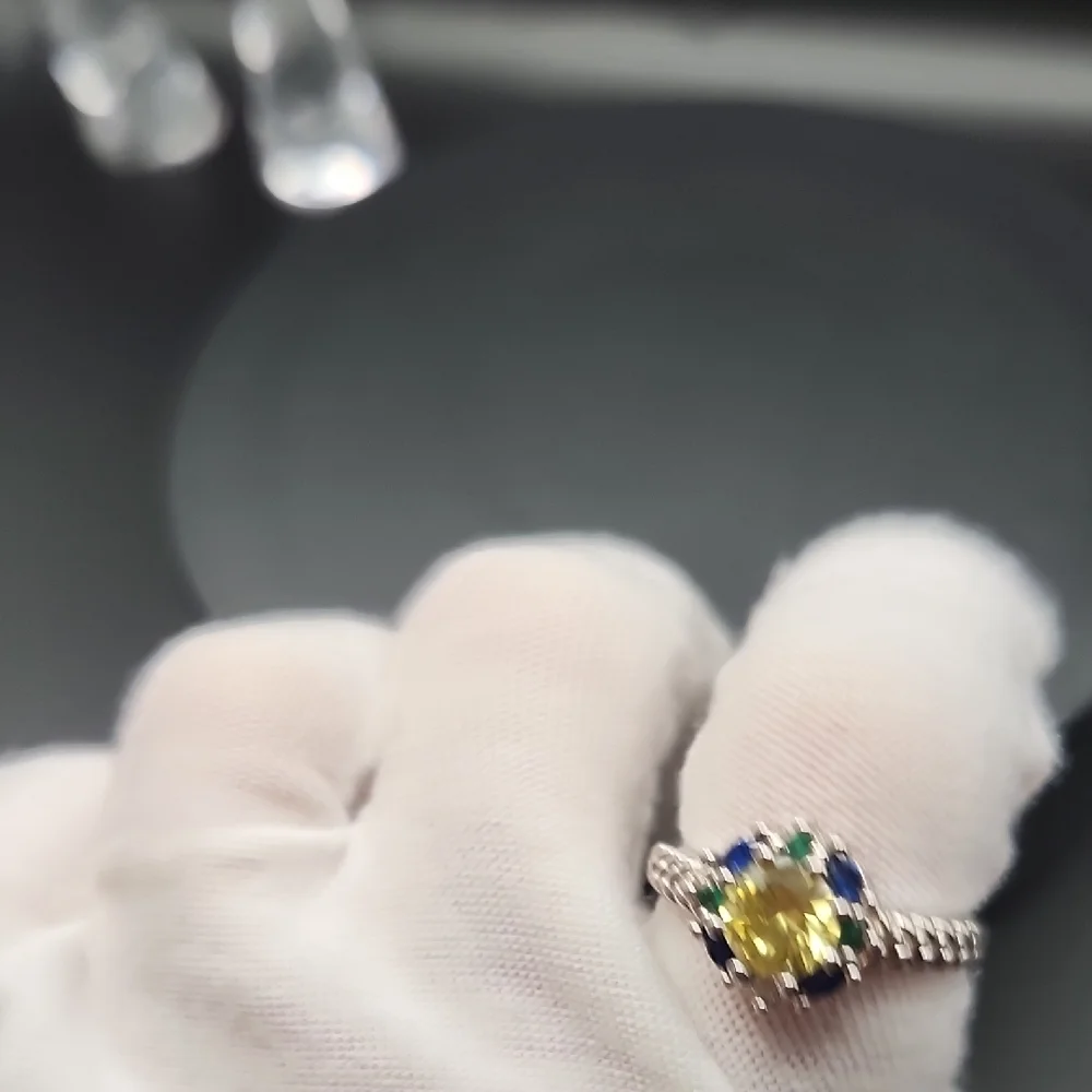 Elegant Silver Ring with Yellow and Blue Stones